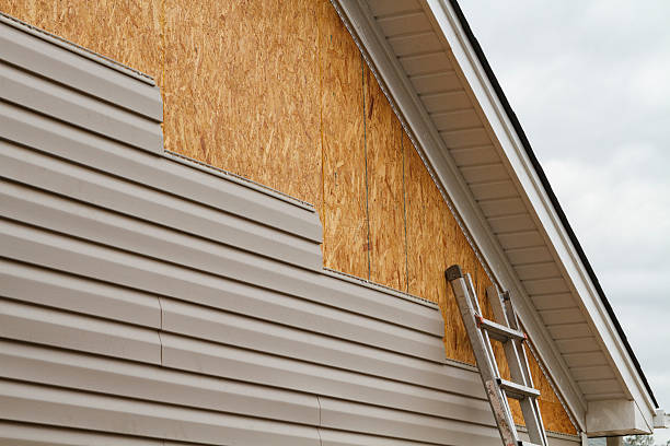 Professional Storm Damage Siding Repair technician working in Bristol, IN